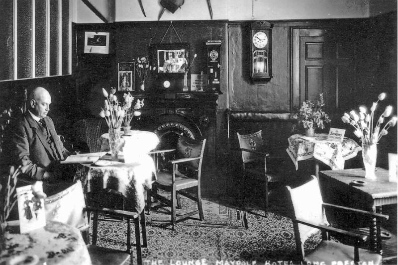 Maypole Lounge c 1928.JPG - The lounge of the Maypole Hotel around 1928. Seated is William Clayton, the Landlord.